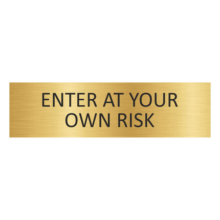 Türschild Enter at your own risk
